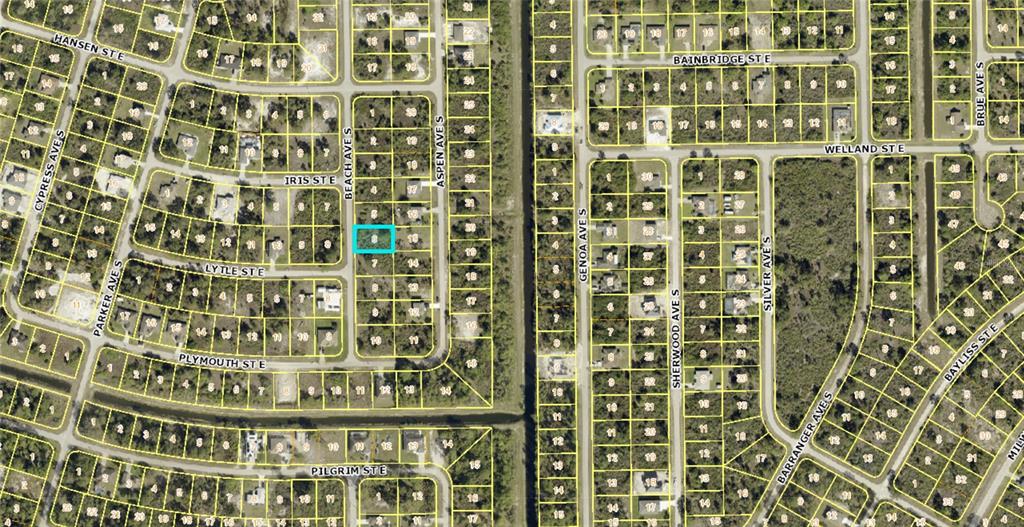 This is an aerial map showing a highlighted vacant lot in a residential neighborhood — 551 BEACH AVENUE S, LEHIGH ACRES, FL