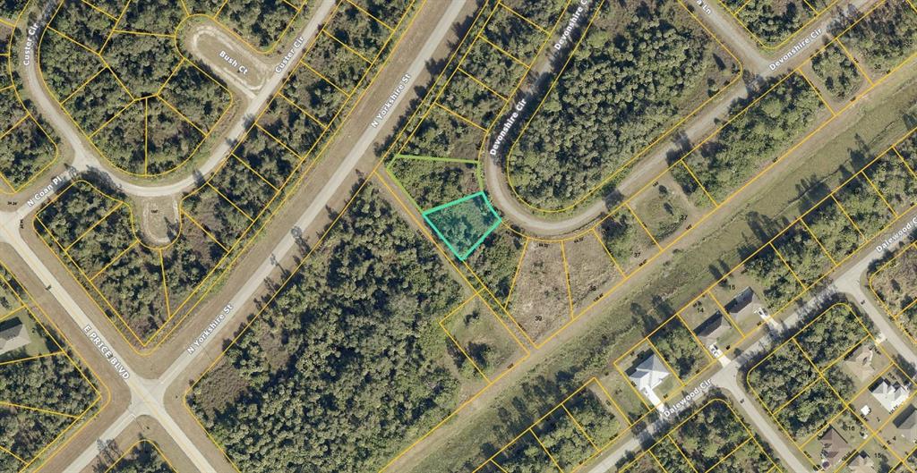This is an aerial map showing a highlighted vacant lot located at a street intersection — 1131209841 & 1131209842 DEVONSHIRE CIRCLE, NORTH PORT, FL