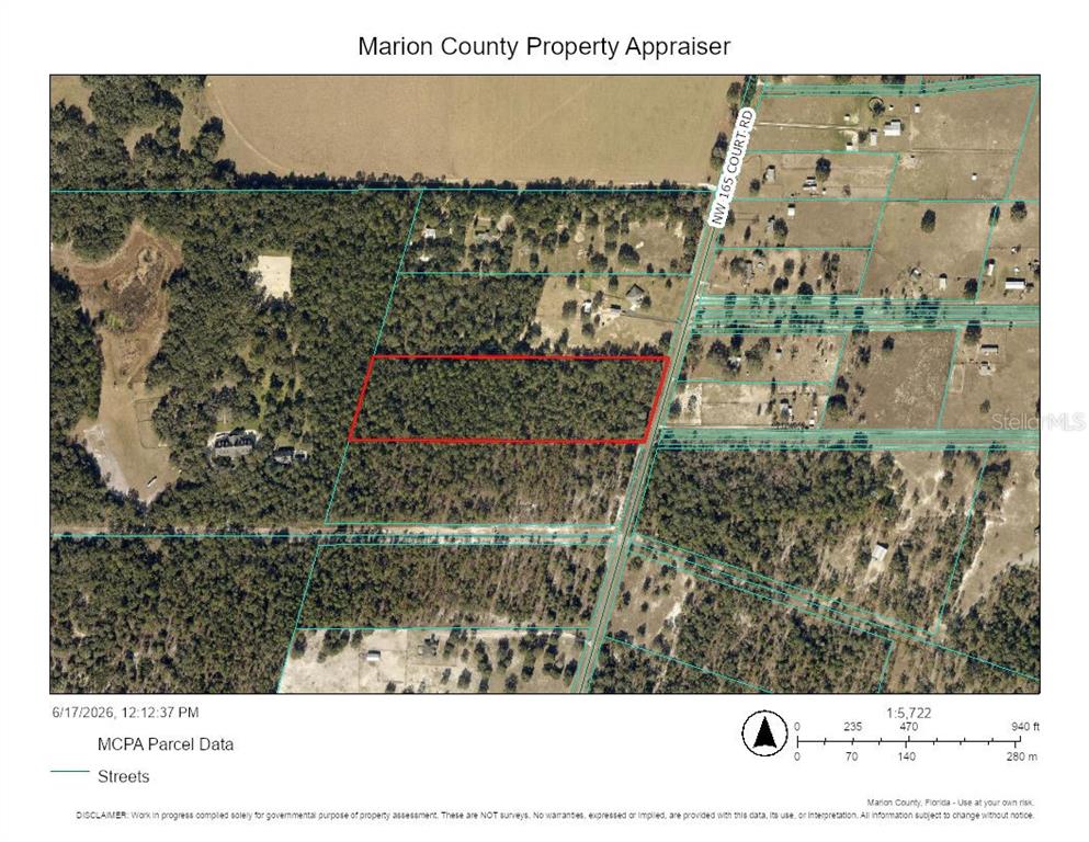 This is an aerial map showing a rectangular property parcel outlined in red — 0 NW 165TH COURT ROAD, DUNNELLON, FL