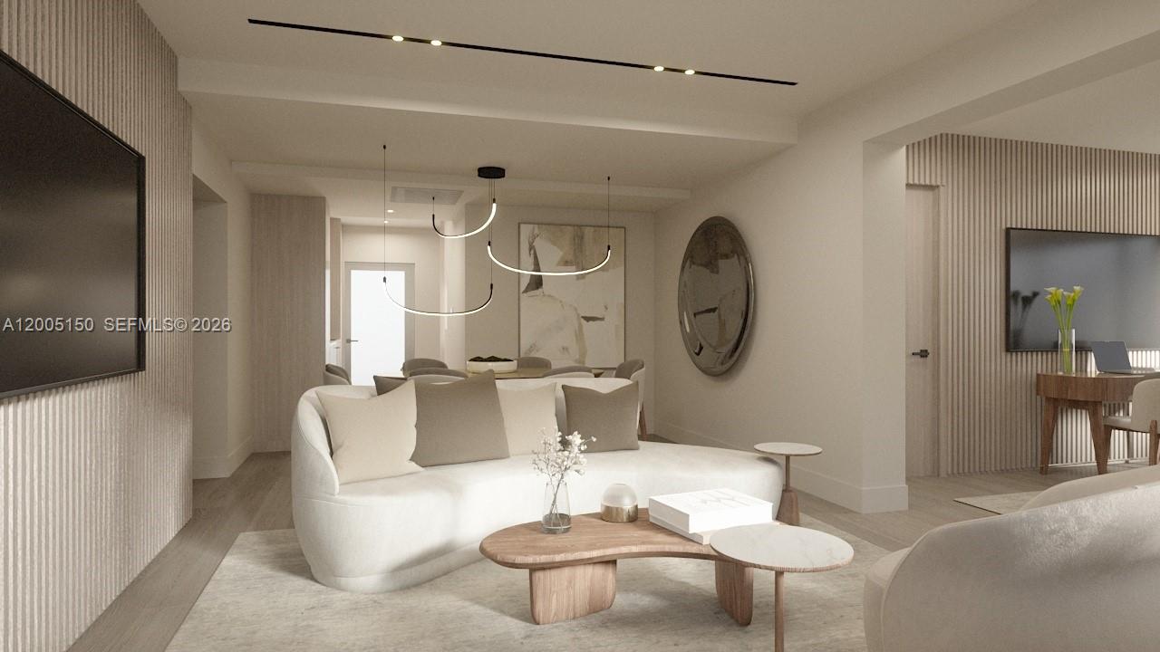 This rendering shows a modern living room with a curved sofa, wood accents, and lighting — 250 Collins Ave # 107, Miami Beach FL 33139, MIAMI BEACH, FL