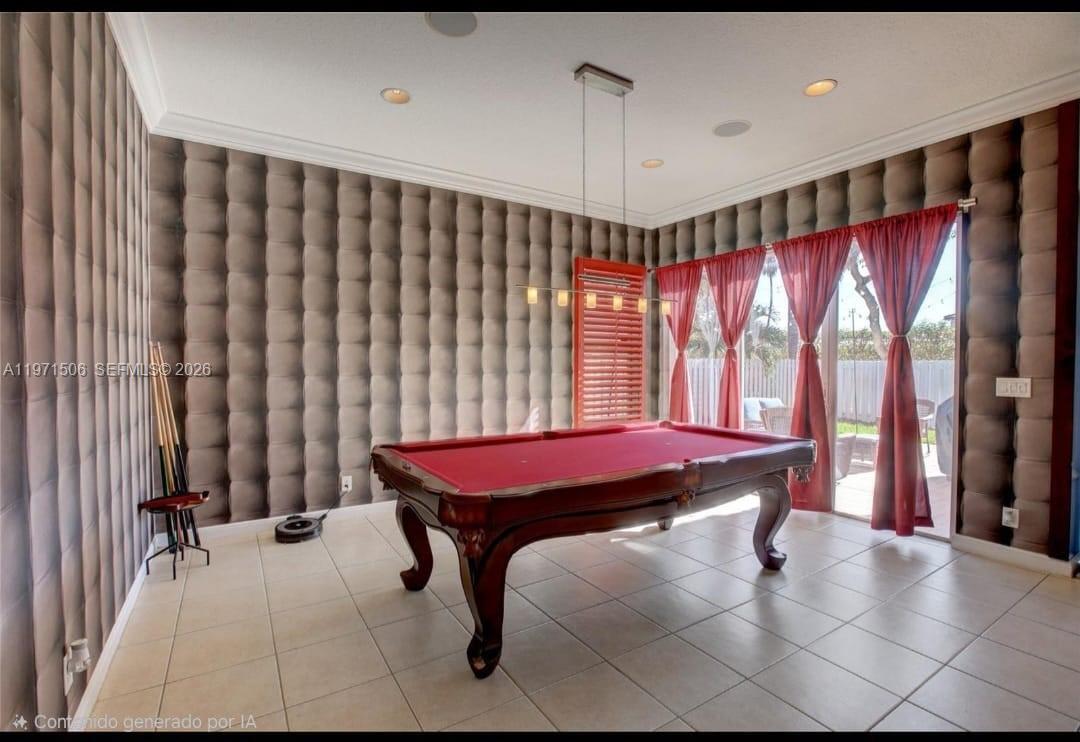 A game room features a pool table, tiled floors, and walls covered in tufted padding — 2789 SW 130th Ter, Miramar FL 33027, MIRAMAR, FL