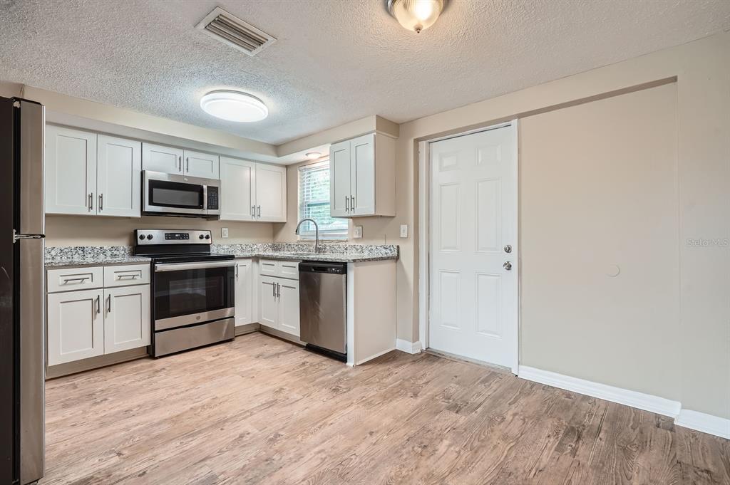 5429 FLORA AVENUE, HOLIDAY, FL — photo 4 of 30
