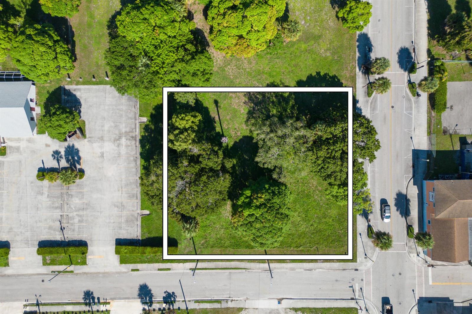 An aerial view shows a rectangular vacant lot highlighted by a white border — N 9th Street, Fort Pierce FL 34950, FORT PIERCE, FL