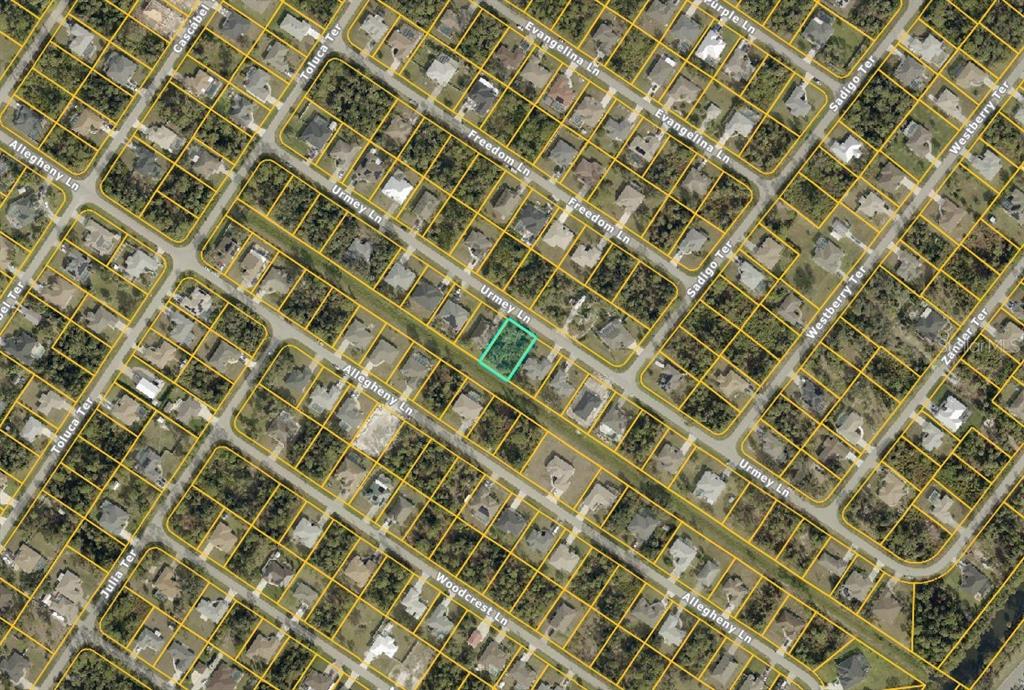 This is an aerial map view of a residential neighborhood with a highlighted vacant lot — Lot #10 URMEY LANE, NORTH PORT, FL