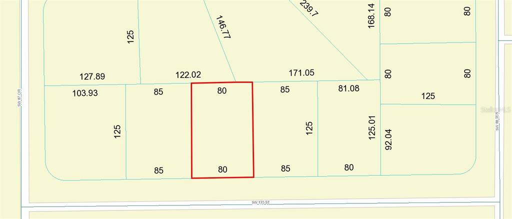 This image is a property plat map showing a rectangular lot highlighted in red — SW 135 STREET, OCALA, FL