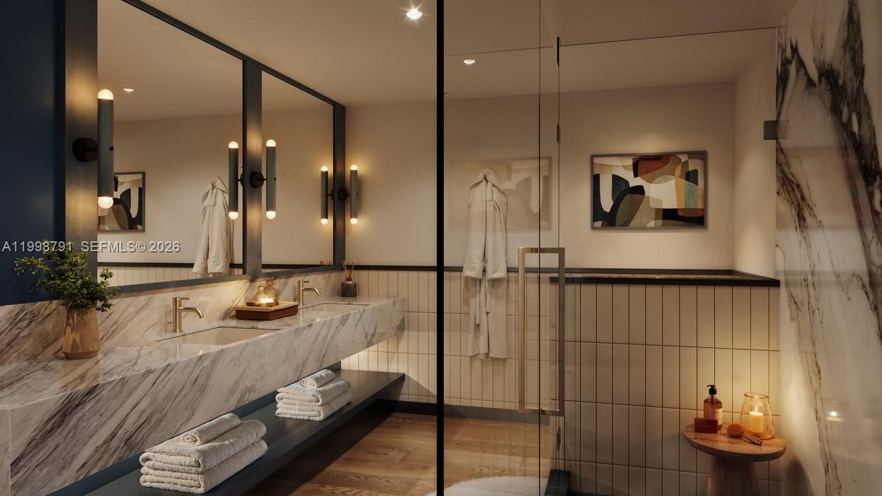 This rendering shows a modern bathroom with a marble double vanity and a glass shower — 335 NW 28th St # 604, Miami FL 33127, MIAMI, FL