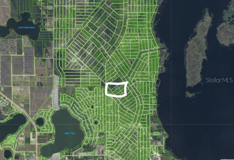 An aerial map shows a highlighted residential lot within a grid of streets near lakes — 1210 HAVILAND STREET, LAKE PLACID, FL