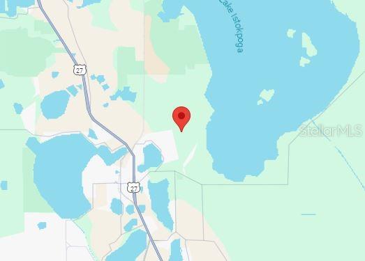 This is a map showing a red location pin near Lake Istokpoga and Highway 27 — 1210 HAVILAND STREET, LAKE PLACID, FL