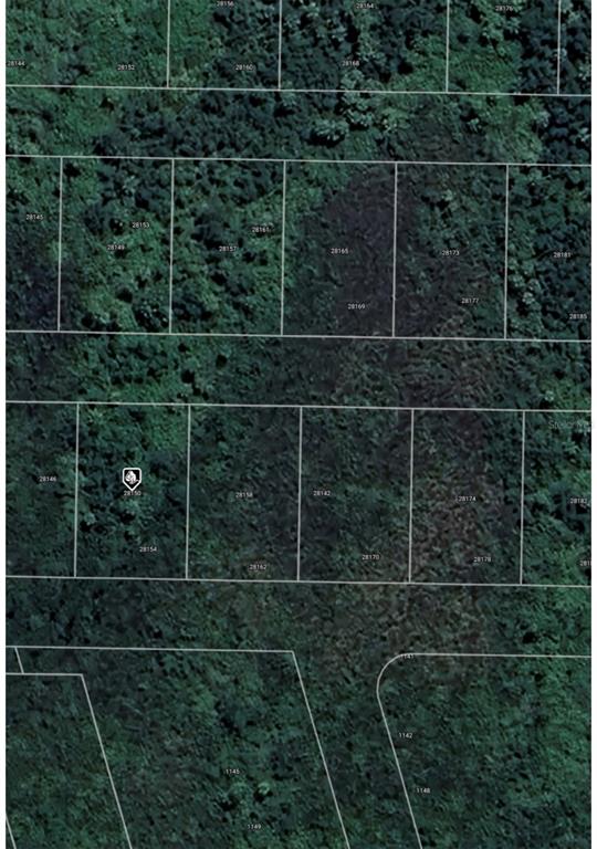 This is an aerial map view showing multiple rectangular land parcels outlined in white — 28150 HARBOUR SUNRISE DRIVE, PUNTA GORDA, FL
