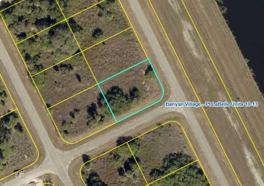 An aerial map view shows a vacant residential lot highlighted in light blue — 1118 Silverfish Drive, FL 33935, FL