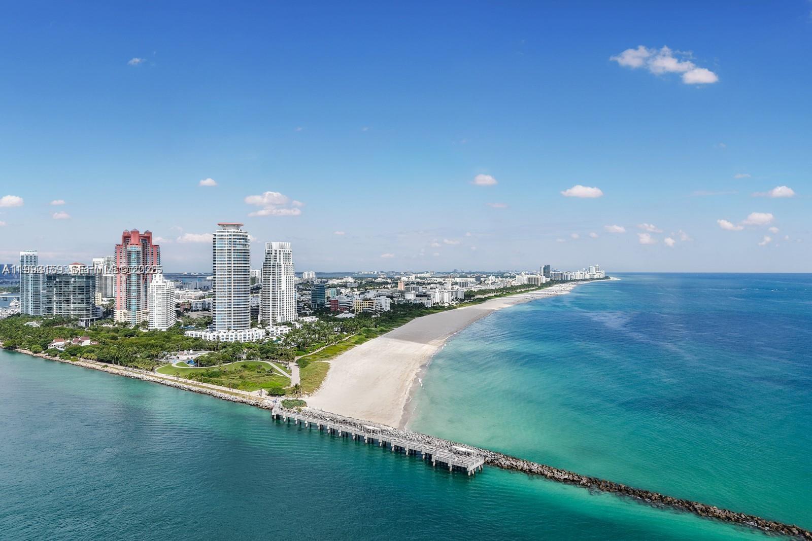 An aerial view of the South Pointe Park pier and beach in Miami Beach — 300 S Pointe Drive # 801, Miami Beach FL 33139, MIAMI BEACH, FL