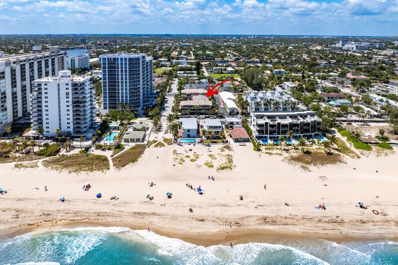 An aerial view of a beachside resort complex with multiple buildings and a swimming pool — 3409 SE 8th Street # 6, Pompano Beach FL 33062, POMPANO BEACH, FL