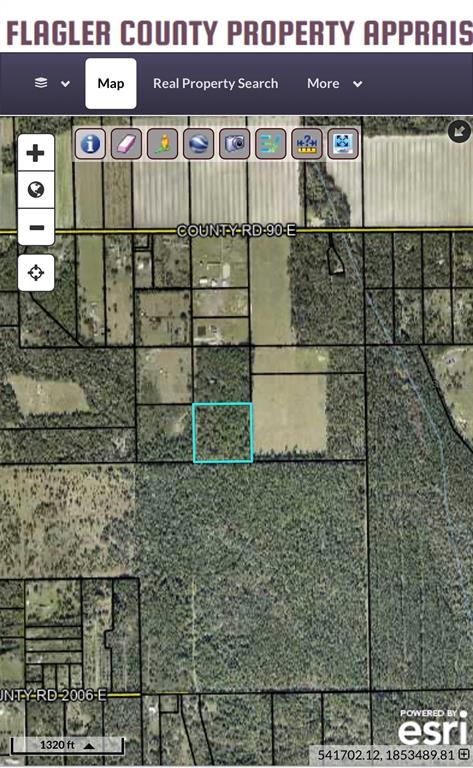 This is a map showing a highlighted parcel of land in Flagler County — 00 COUNTY ROAD 90 E, BUNNELL, FL