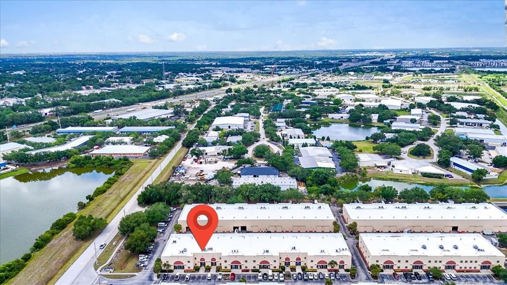 This aerial view shows a commercial warehouse complex with a red location pin — 6321 PORTER UNIT 3, SARASOTA, FL