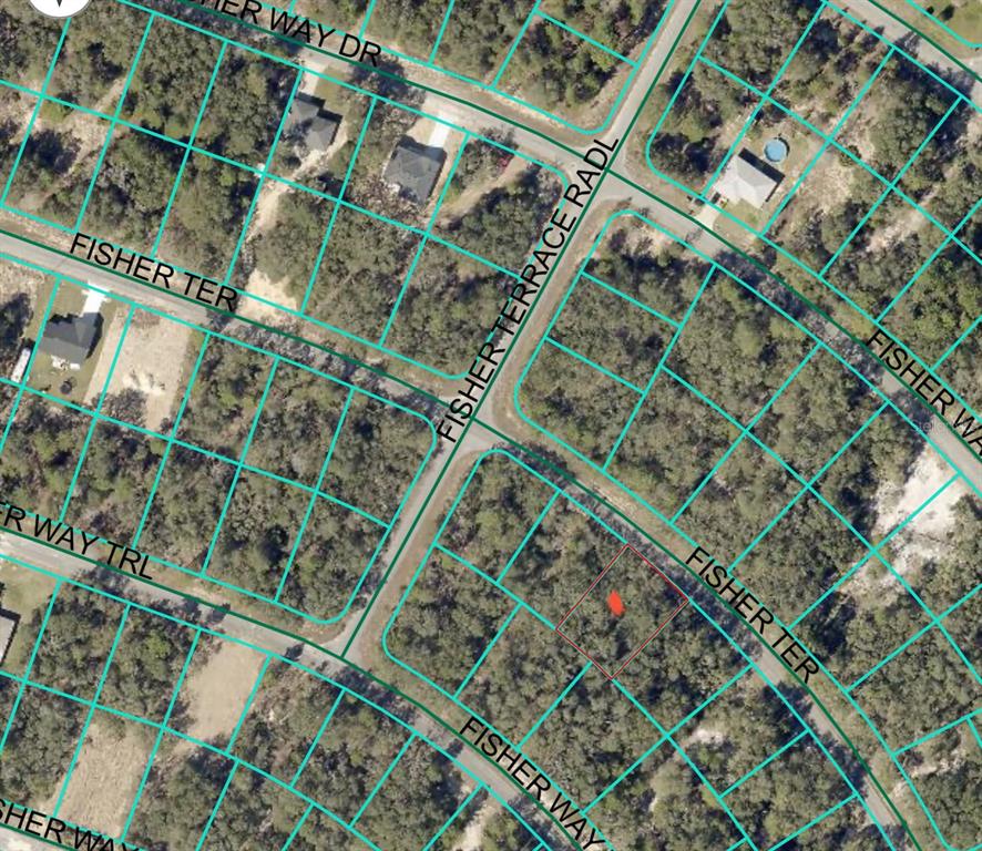 This is an aerial map showing a vacant lot highlighted in red within a neighborhood — FISHER TERRACE UNIT 8, OCKLAWAHA, FL