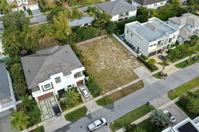 An aerial view shows a vacant residential lot situated between two modern houses — 1001 NE 3rd Avenue, Boca Raton FL 33432, BOCA RATON, FL
