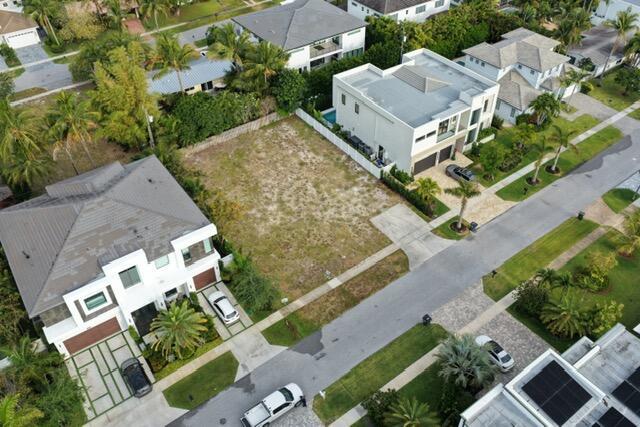 An aerial view shows a vacant residential lot situated between two modern houses — 1001 NE 3rd Avenue, Boca Raton FL 33432, BOCA RATON, FL