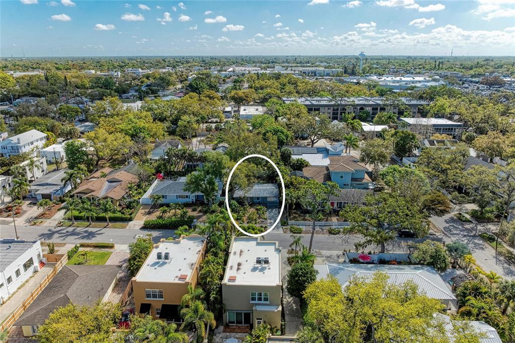 An aerial view shows a residential neighborhood with a single-story house circled in white — 3625 JACINTO COURT, SARASOTA, FL