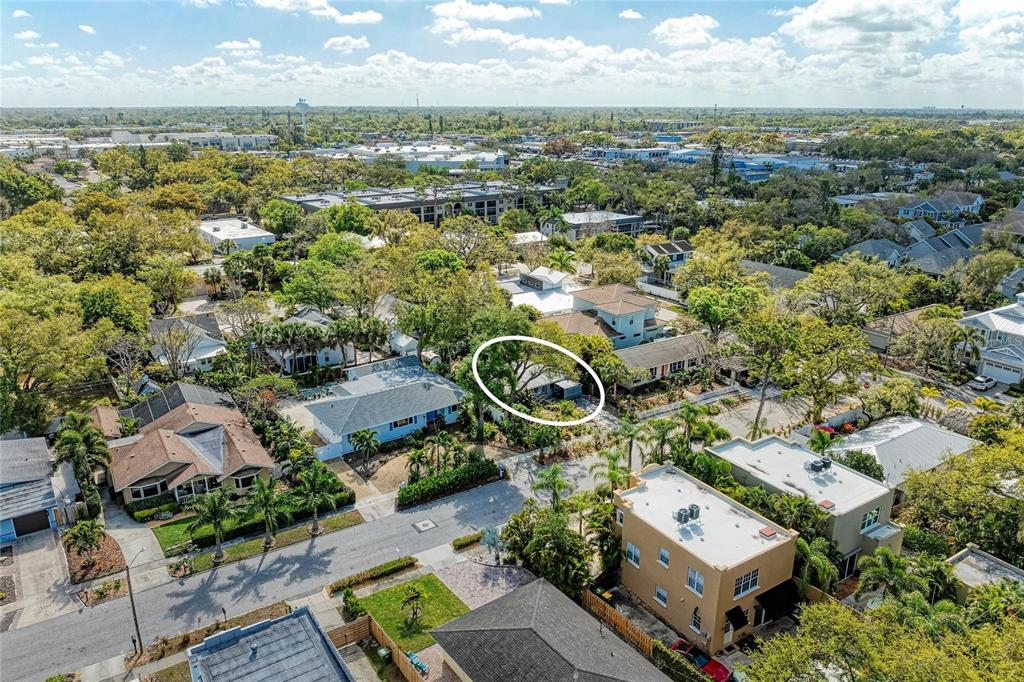 An aerial view shows a residential neighborhood with a house circled in white — 3625 JACINTO COURT, SARASOTA, FL