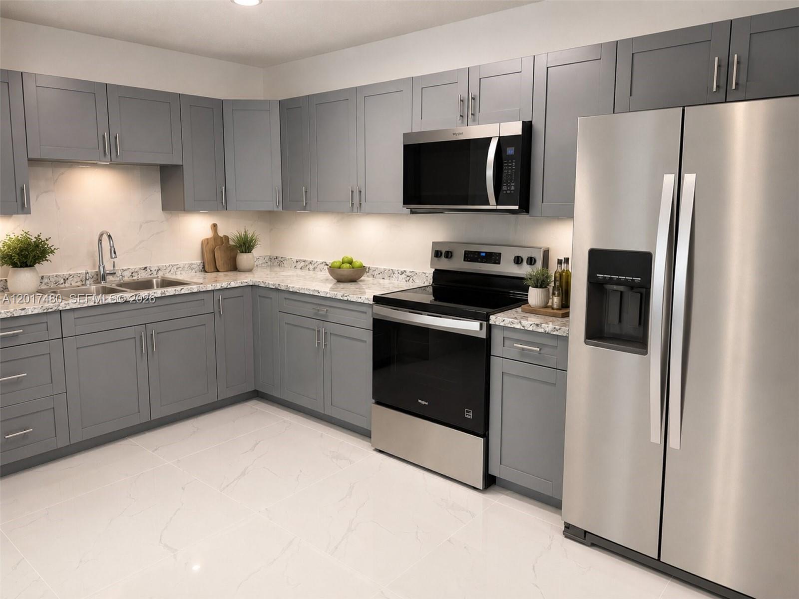 A kitchen features gray shaker cabinets, stainless steel appliances, and white marble-patterned countertops and flooring — 14830 Naranja Lakes Blvd, Homestead FL 33032, HOMESTEAD, FL