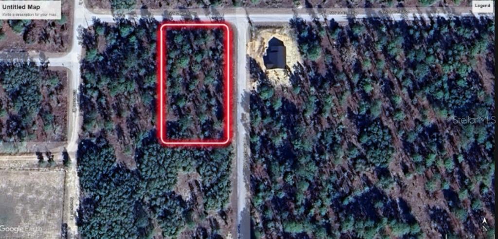 An aerial map view shows a rectangular plot of land outlined in red near a road — LOMBARDY LANE, DUNNELLON, FL