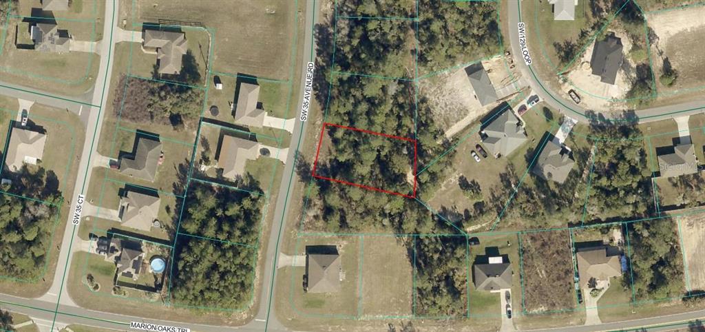 This is an aerial map showing a vacant, wooded residential lot outlined in red — TBD SW 35TH AVENUE ROAD, OCALA, FL