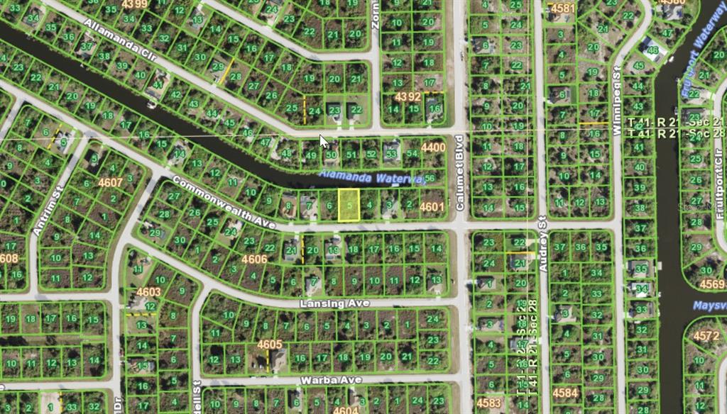 This is a map showing residential lots and waterways in a suburban neighborhood — 13484 COMMONWEALTH AVENUE, PORT CHARLOTTE, FL