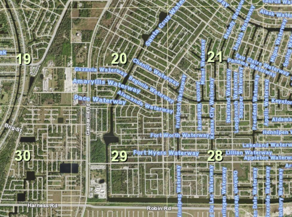 This is a map showing residential streets and waterways in a suburban neighborhood — 13484 COMMONWEALTH AVENUE, PORT CHARLOTTE, FL