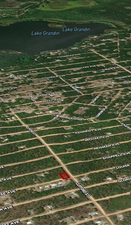 An aerial map view shows a highlighted rectangular lot located near Lake Grandin — LOT 36 LOUISE AVENUE, INTERLACHEN, FL
