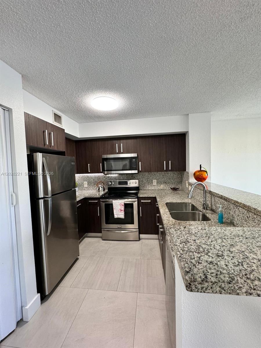 4420 NW 107th Ave # 206, Doral FL 33178