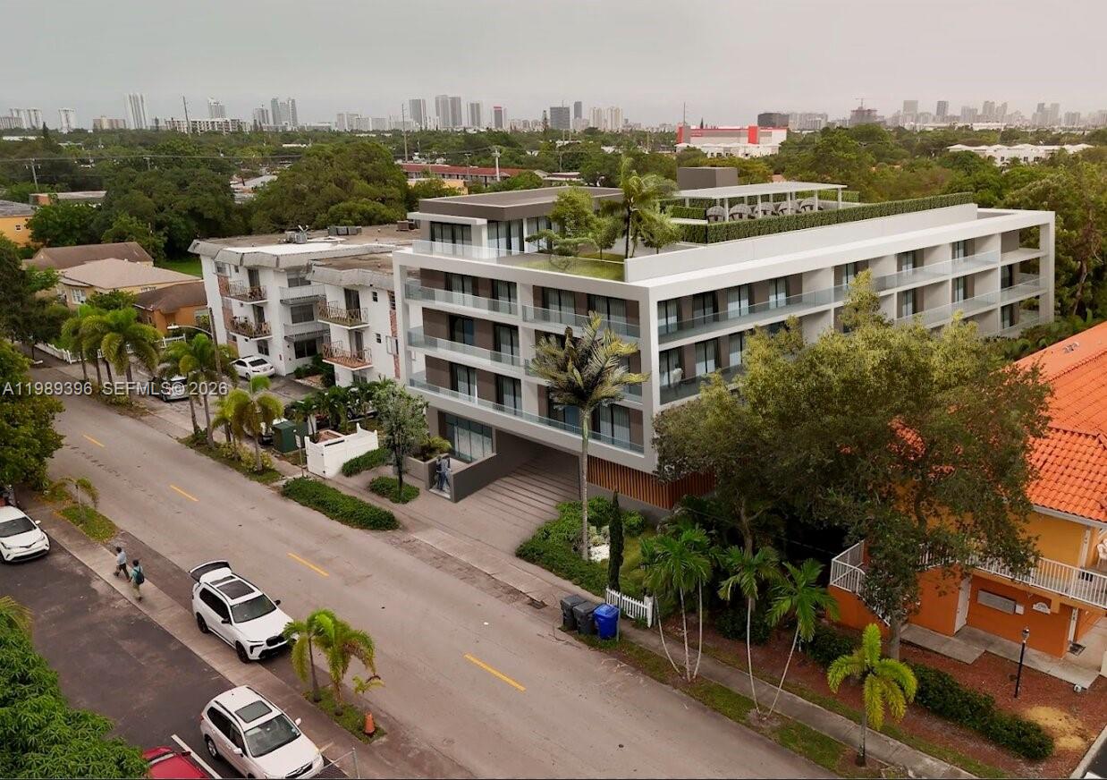 This is a digital architectural rendering of a modern multi-story apartment building with a rooftop terrace — 2242 Monroe St, Hollywood FL 33020, HOLLYWOOD, FL