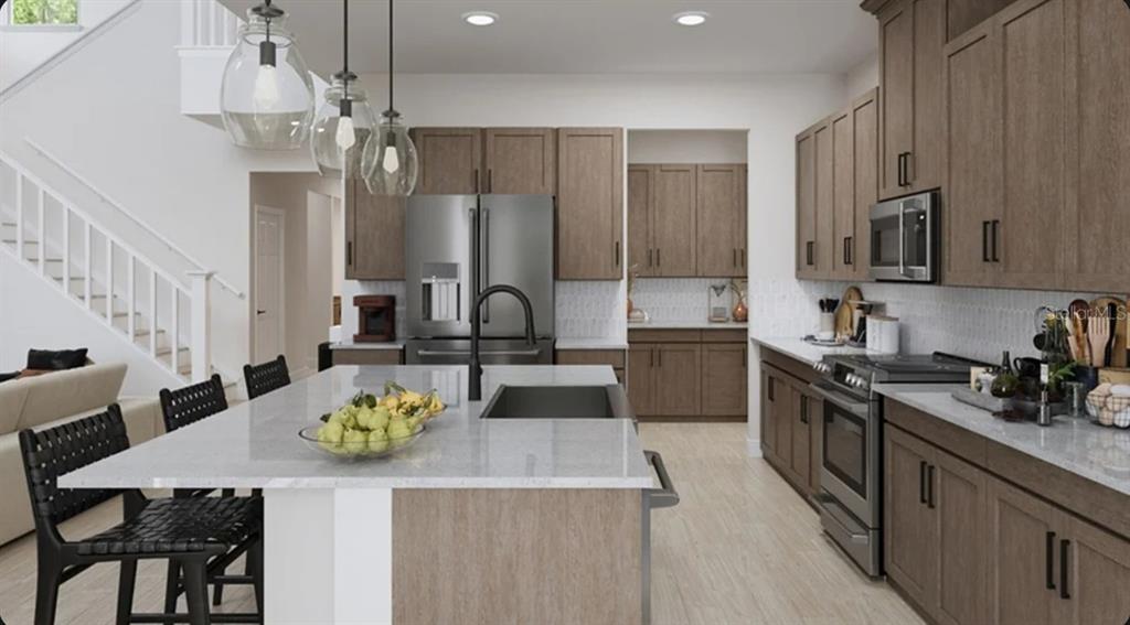 This rendering shows a modern kitchen with wood cabinets, a large island, and stainless appliances — 7895 INTERSTELLAR AVENUE, SARASOTA, FL