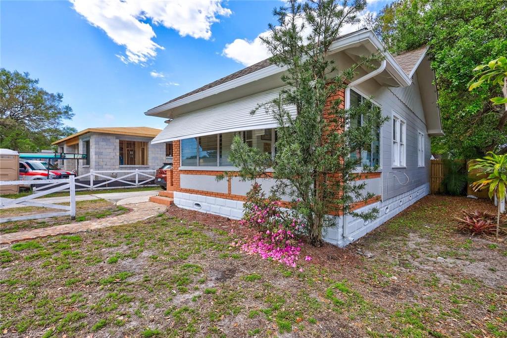 A single-story house with a brick and light-colored siding exterior and a front porch — 2521 4TH STREET S, ST PETERSBURG, FL