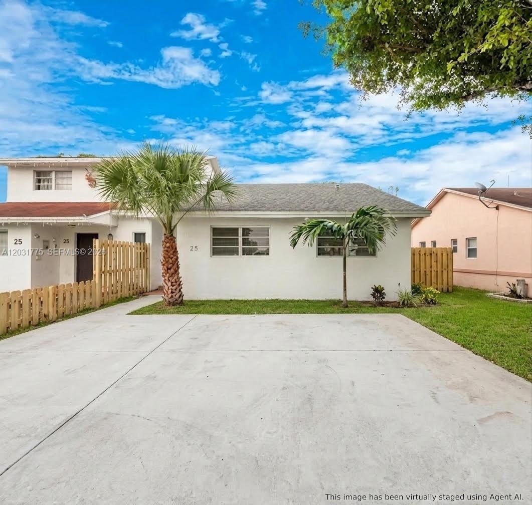 A white single-story house with a concrete driveway, two palm trees, and a wooden fence — 23 NW 109th Ave, Miami FL 33172, MIAMI, FL