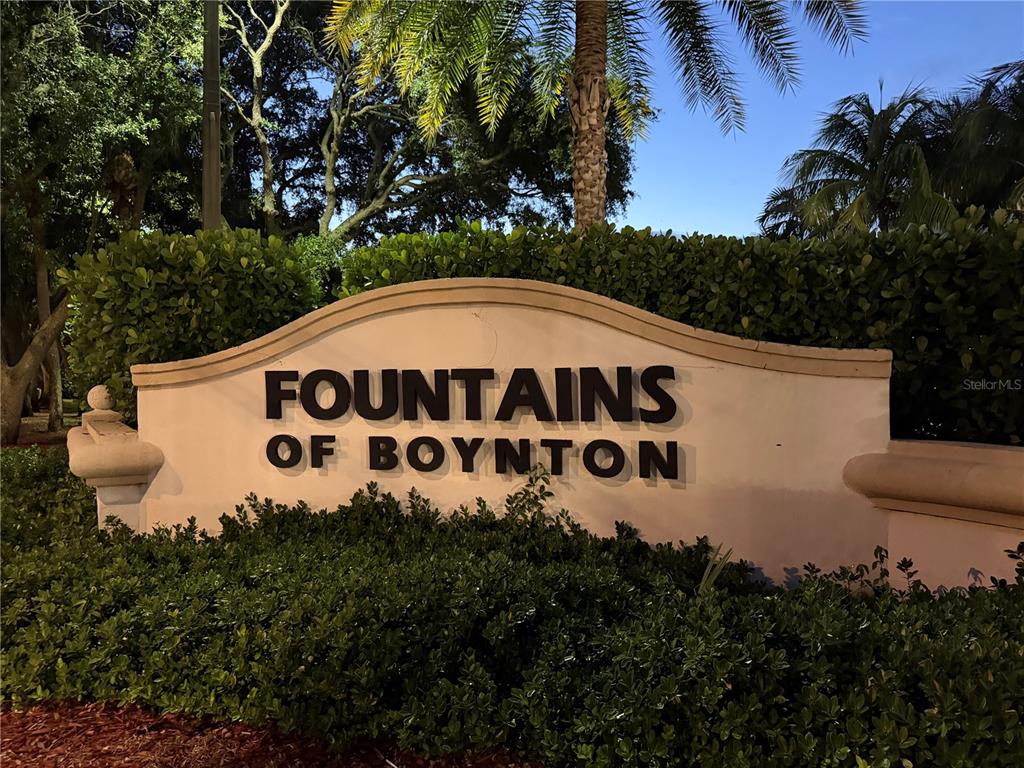 A beige monument sign for Fountains of Boynton stands in front of green landscaping — TBA BOYNTON BEACH BOULEVARD, BOYNTON BEACH, FL