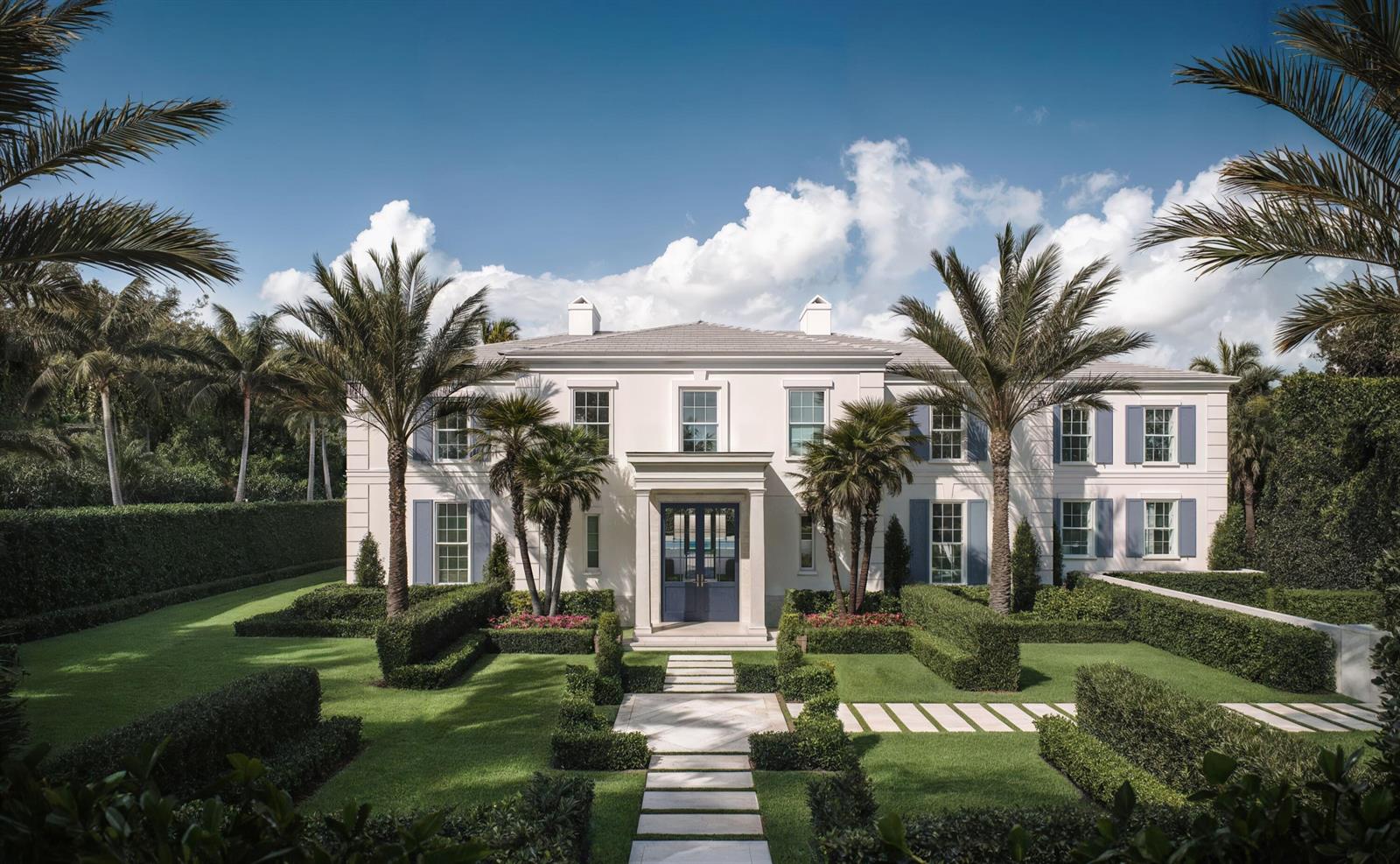 A two-story white house with blue shutters and a manicured garden with palm trees — 124 Cocoanut Row, Palm Beach FL 33480, PALM BEACH, FL