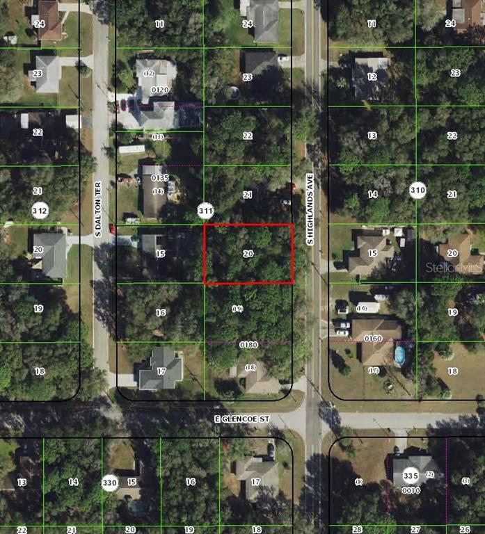 This is an aerial map showing a vacant lot outlined in red between two streets — 3552 S HIGHLANDS AVENUE, INVERNESS, FL