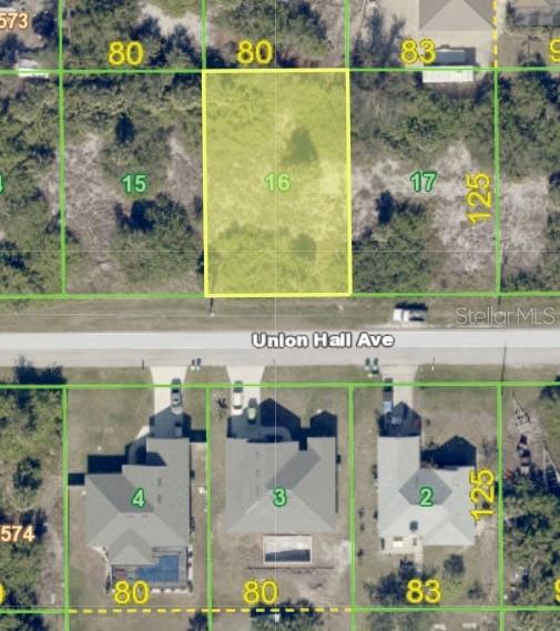 This aerial map shows a vacant, rectangular residential lot highlighted in yellow along a paved road — 14132 UNION HALL AVENUE, PORT CHARLOTTE, FL