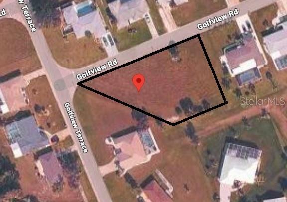 This is an aerial map view of a vacant, irregularly shaped residential lot — 1 GOLFVIEW ROAD S, ROTONDA WEST, FL