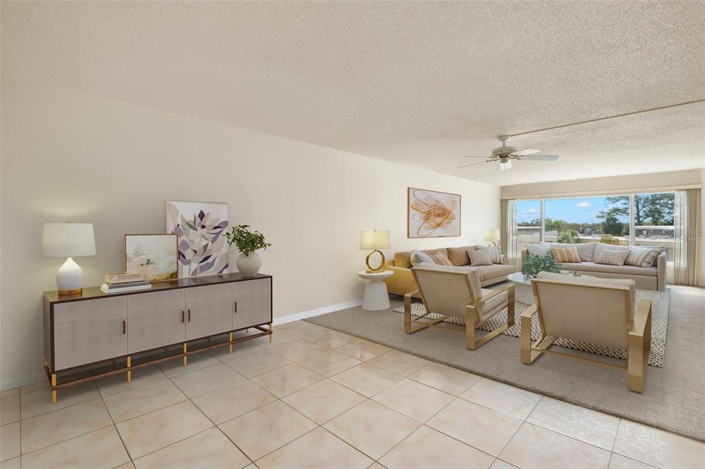 A living room features tile flooring, a beige area rug, and a neutral-toned seating arrangement — 225 COUNTRY CLUB DRIVE UNIT F-1401, LARGO, FL