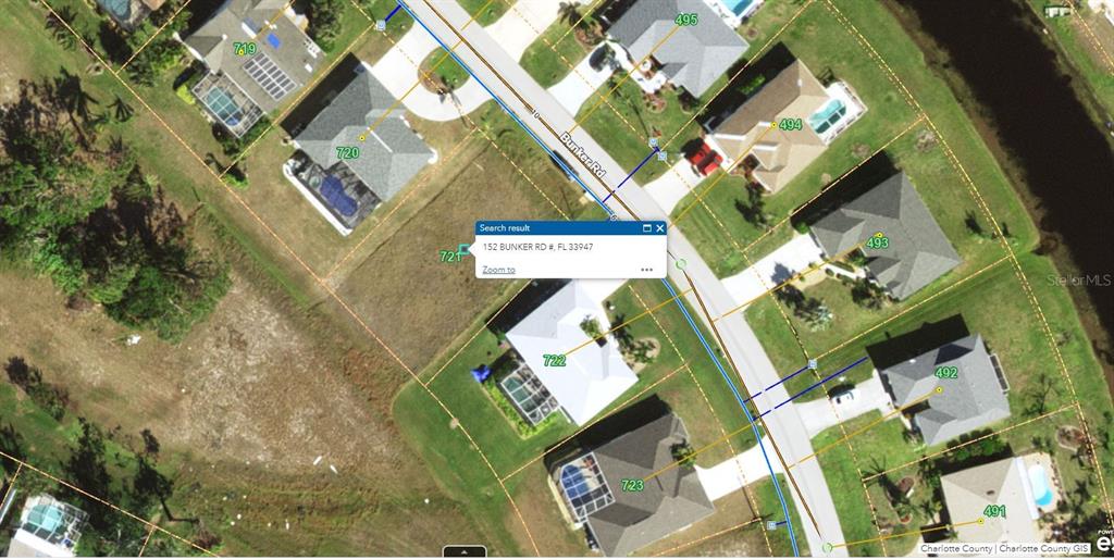 This is a satellite map view showing residential properties along a street — 152 BUNKER ROAD, ROTONDA WEST, FL
