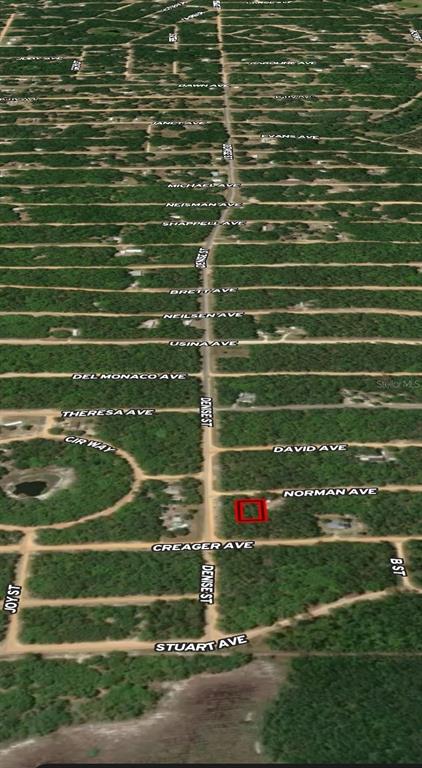 An aerial map view shows a rectangular plot of land highlighted in red near roads — LOT 16 NORMAN AVENUE, INTERLACHEN, FL