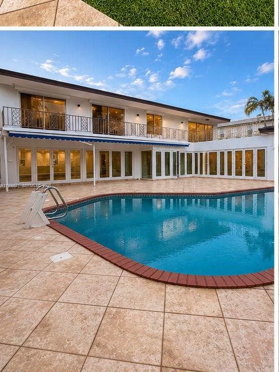 A two-story house exterior features a large swimming pool and a tiled patio area — 4403 Palm Ln, Miami FL 33137, MIAMI, FL