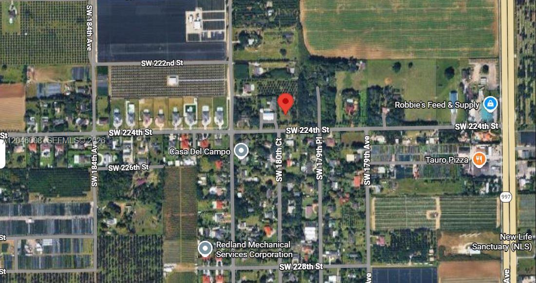 This is a satellite map view showing a residential area with roads and property markers — UNINCORPORATED SW 224 ST, Miami FL 33170, MIAMI, FL