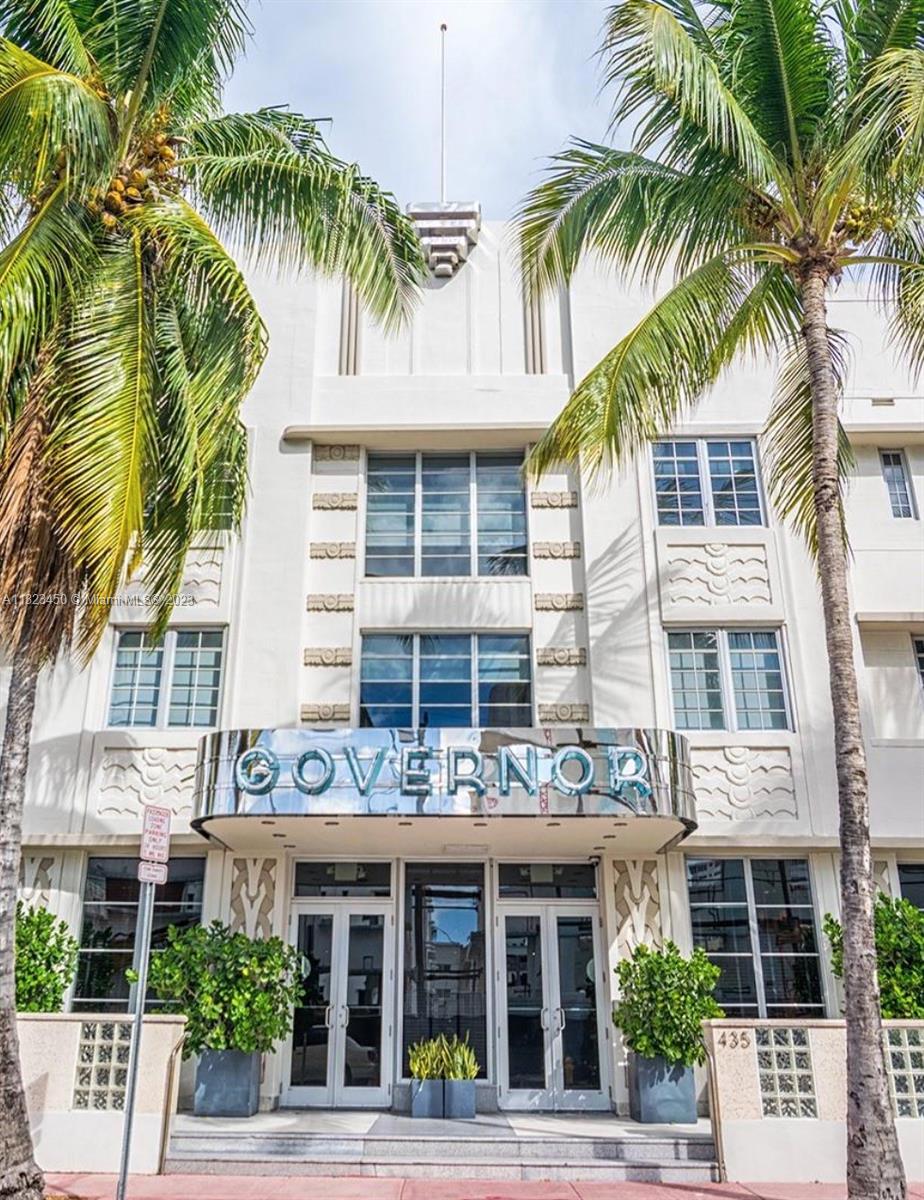 The exterior of a white Art Deco building features a chrome sign reading Governor — 435 21st St # 223, Miami Beach FL 33139, MIAMI BEACH, FL