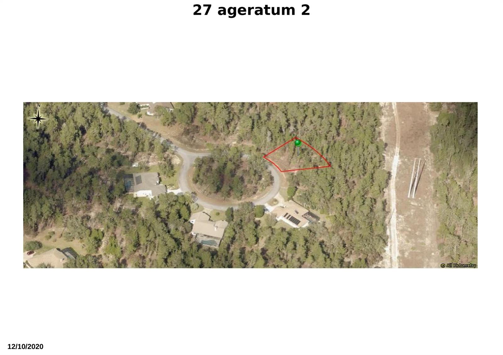 This aerial map shows a wooded residential lot outlined in red within a cul-de-sac — 27 Ageratum Court, FL 34446, FL