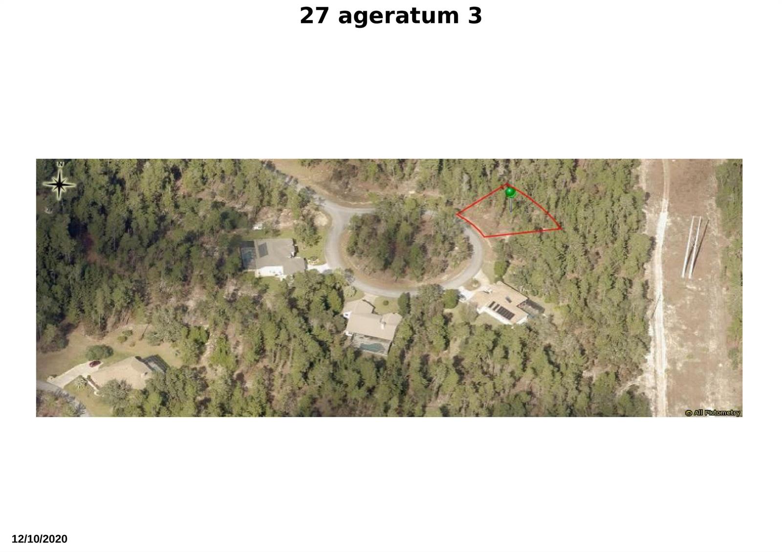 This is an aerial map showing a wooded residential lot outlined in red — 27 Ageratum Court, FL 34446, FL