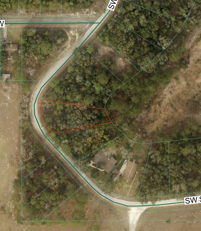 This is an aerial map showing a vacant lot outlined in red — 0 SW SHOREWOOD DRIVE, DUNNELLON, FL