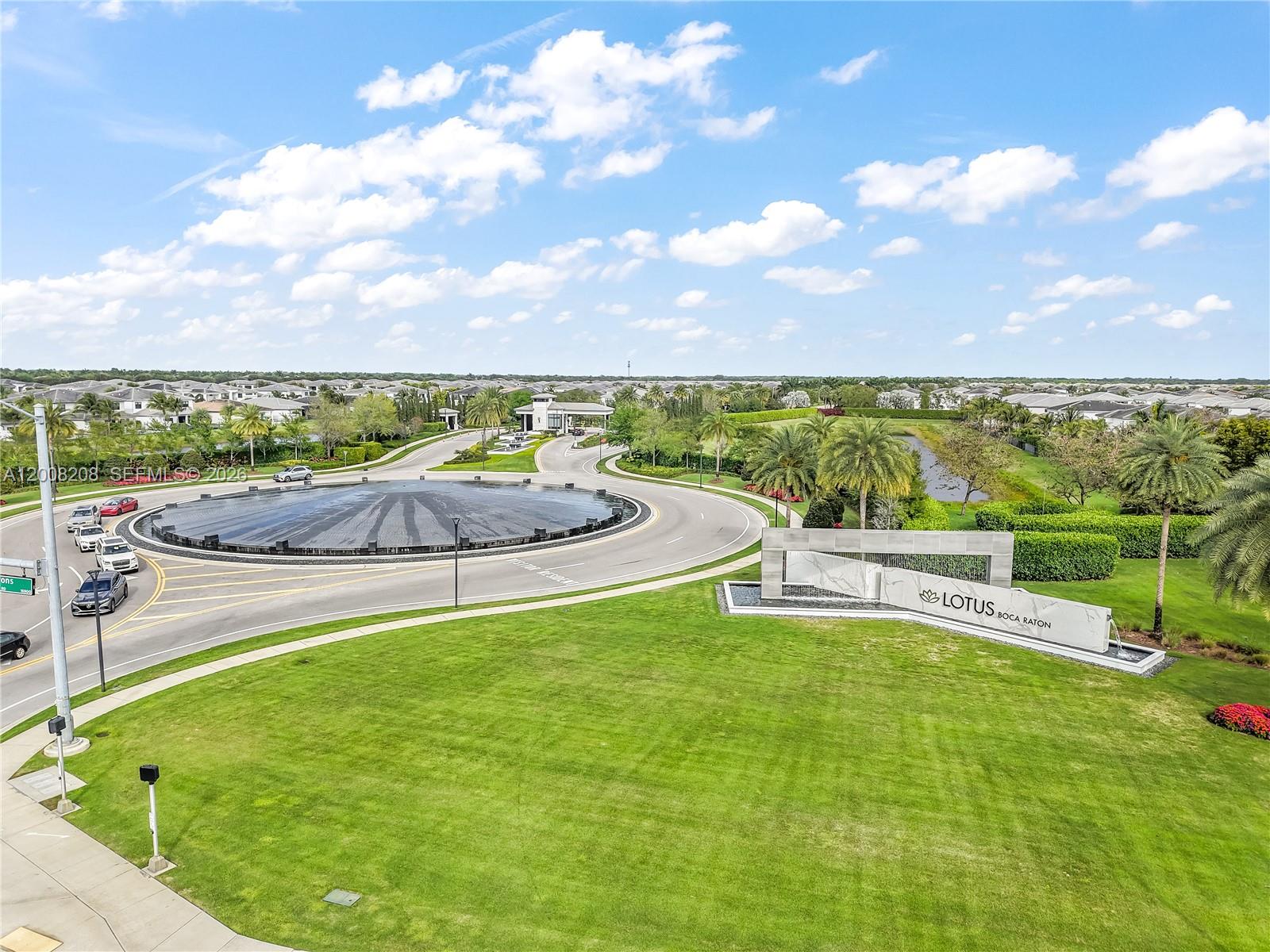 An aerial view shows the entrance to the Lotus Boca Raton residential community — 17197 Teton River Rd # 0, Boca Raton FL 33496, BOCA RATON, FL