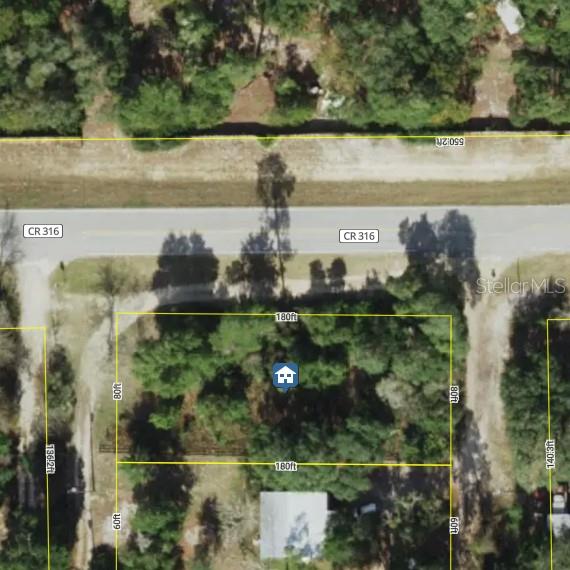 This is an aerial map showing a rectangular property lot with dimensions marked in feet — NE 236TH COURT, FORT MC COY, FL